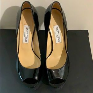 Like new. Jimmy Choo peep toe pumps.